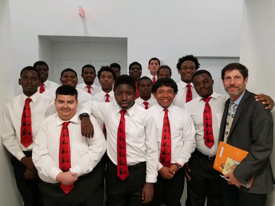 Student leaders in the 5000 Role Models of Excellence Project volunteering.